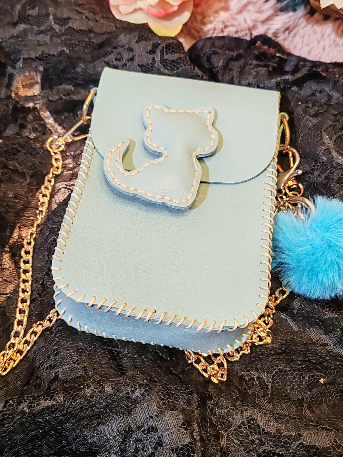 Jolie pochette artisanale en similicuir