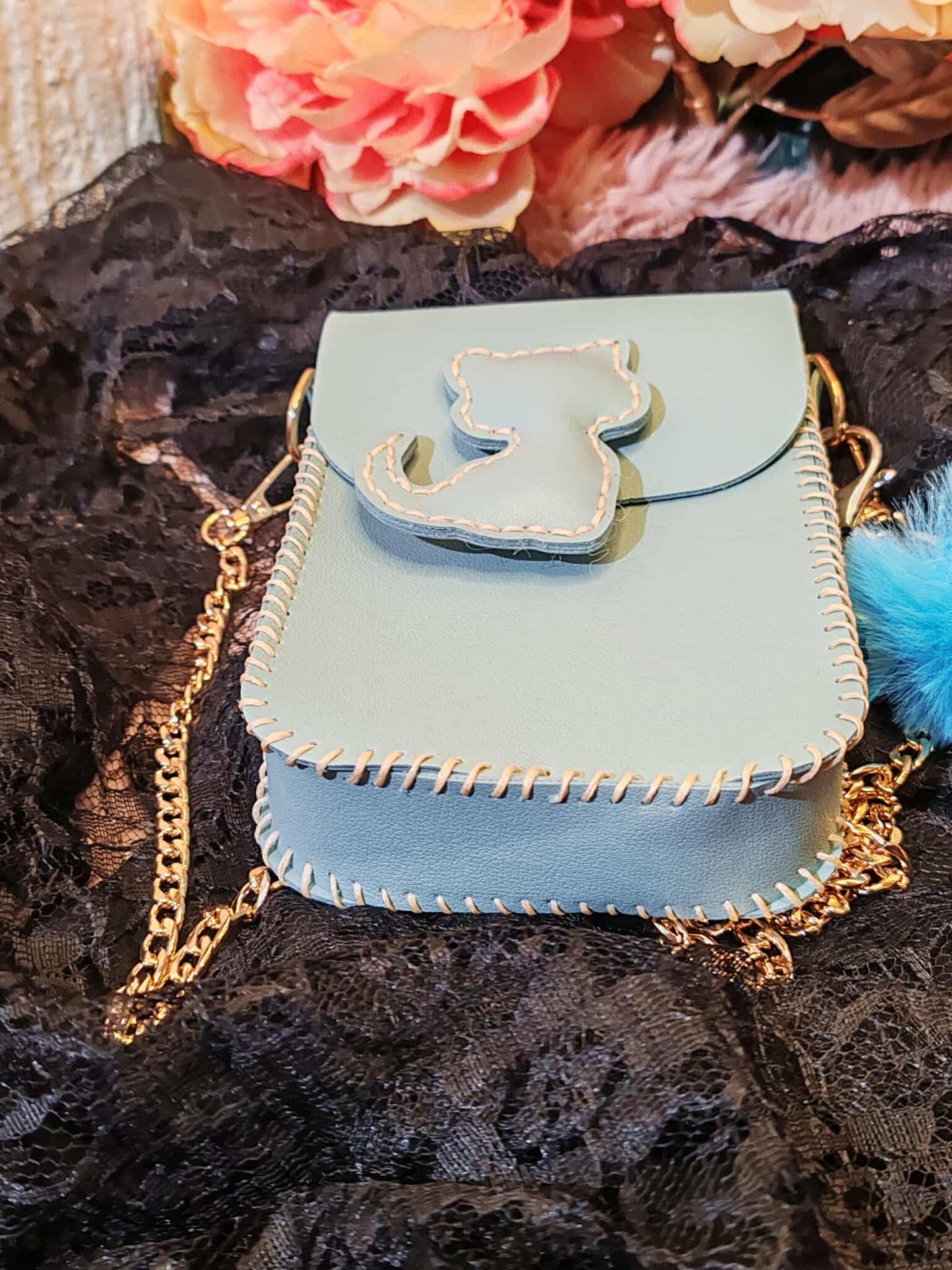 Jolie pochette artisanale en similicuir